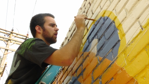 Evan On Ladder Painting
